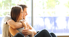 couple looking out window