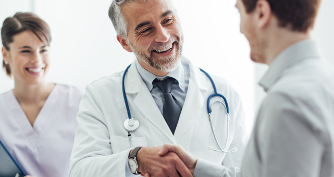 doctor shaking patient's hand