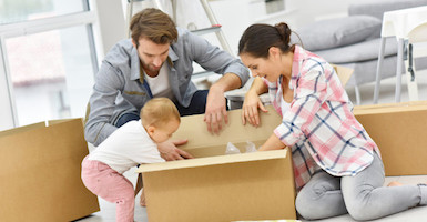 family unpacking box