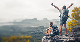 couple hiked to top of cliff