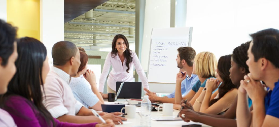 female leading business meeting