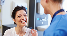woman talking to doctor