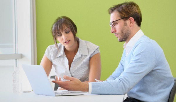 business woman and business man having a discussion