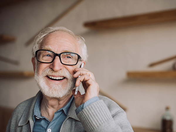 elderly man on phone