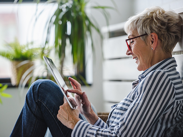 elderly woman on tablet