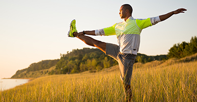 man-doing-yoga-outside