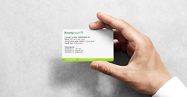 man holding member ID card