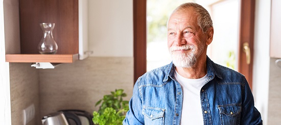 adult retired man in the kitchen