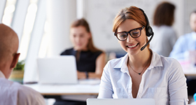 professional woman talking into headset