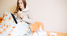sick woman in bed