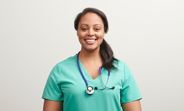 smiling nurse with stethoscope