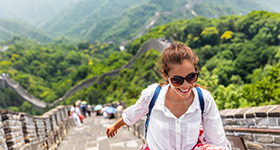 Woman walking Great Wall of China