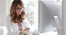 woman looking at laptop