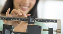 woman on weighing scale