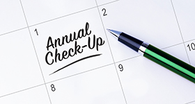 calendar with annual check up written on it