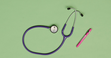 stethoscope and pen
