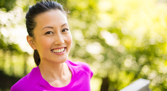 association-woman-outside-smiling