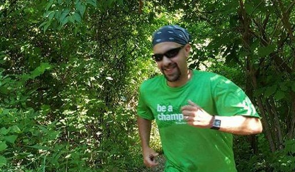 Jason Davidson running in woods