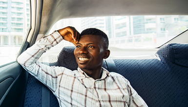 man in car